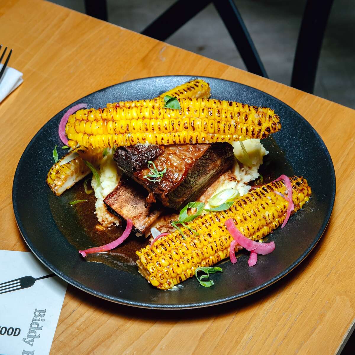 Braised beef short rib with charred corn and mashed potato, served at Biddy Kate's Cafe Bar
